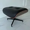 Luksusowa aranżacja fotela Lounge z podnóżkiem w eleganckim wnętrzu. Primavera Home w Warszawie.