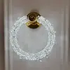 Dekoracyjny kinkiet kryształowy ICE ROUND w aranżacji wnętrza od Primavera Home.