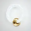 Zbliżenie na kinkiet kryształowy ICE ROUND, podkreślające jego elegancki design od Primavera Home.
