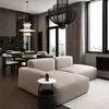 Aranżacja okrągłego stolika kawowego Tavolino w nowoczesnym salonie. Projekt od Primavera Home.