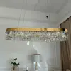 Złoty żyrandol Diamond w aranżacji nowoczesnego wnętrza od Primavera Home.
