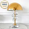 lampa stołowa złota z ozdobnymi kulami w promocji Azurra