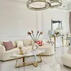 Kryształy w żyrandolu Ring Złoty Eclipse odbijające światło. Projekt Primavera Home.