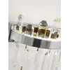 Widok z boku kinkietu kryształowego srebrnego Bulgari. Lampa od Primavera Home.