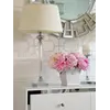Komoda glamour lakierowana drewniana na stalowych nogach Lorenzo M Silver w zaciszu nowoczesnego salonu. Meble na zamówienie od PRIMAVERA HOME.