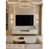 Perspektywa na komodę RTV, podkreślająca jej elegancki design, od Primavera Home.