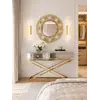 Konsola lustrzana CHICAGO GOLD glamour stalowa złota eksponowana w showroomie. Meble na zamówienie od Primavera Home.