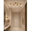 Aranżacja nowoczesnego wnętrza z lampą glamour, złotą, sufitową, designerską, ekskluzywną, cztery punkty świetlne MODERN 4. Oświetlenie od Primavera Home.