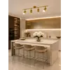 Lampa glamour, złota, sufitowa, designerska, ekskluzywna, cztery punkty świetlne MODERN 4 widoczna z boku, doskonale komponująca się z nowoczesnym wnętrzem. Projekt od Primavera Home.
