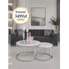 Perspektywa na okrągły stolik kawowy srebrny z marmurowym blatem 2w1, ukazująca jego nowoczesny design. Aranżacja nowoczesnego wnętrza od Primavera Home.