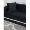 Sofa Glamour Madonna Czarna w otoczeniu żywych roślin, stylowa harmonia od Primavera Home.