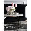 Widok okrągłego stolika kawowego srebrnego z marmurowym blatem 2w1 w świetle dziennym, podkreślający jego elegancję. Ekspozycja w salonie od Primavera Home.
