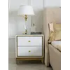 Aranżacja szafki w salonie, doskonale harmonizująca z innymi meblami od Primavera Home.