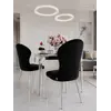 Ekspozycja w salonie z ekskluzywnym krzesłem do jadalni glamour, w stylu nowoczesnym od Primavera Home.
