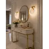 Szczegółowy detal wykończenia kinkietu Kryształowy ICE ROUND, podkreślający jego elegancję. Ekspozycja w salonie od Primavera Home.