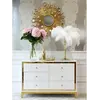 Komoda glamour LORENZO M na stalowych nogach złota biała w jasnym wnętrzu, idealnym dla Primavera Home.