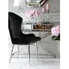 Detal nóg stalowych ekskluzywnego krzesła do jadalni glamour, ukazujący ich nowoczesny design od Primavera Home.