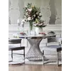 Luksusowe krzesło stalowe, do jadalni, do toaletki, designerskie, nowoczesne, glamour, szare, srebrne MARCO w ujęciu z przodu. Oświetlenie na zamówienie od Primavera Home.
