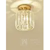 Lampę Sufitową Kryształową Stars S Złota prezentuje perspektywa, akcentując jej unikalny design. Wnętrze od Primavera Home.