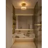 Lampa Sufitowa Kryształowa pojedynczy punkt świetlny DIAMOND XS , lampa glamour – Primavera Home w aranżacji w nowoczesnym salonie, tworząca wyjątkowy klimat.