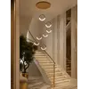 Nowoczesny żyrandol w aranżacji salonu. Designerskie oświetlenie od Primavera Home.