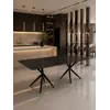 Detale wykończenia stołu w czarnym kolorze, idealnego do nowoczesnych wnętrz z oferty Primavera Home.