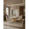 Zbliżenie na detal wykończenia Designer Italian-Style Chair in Beige and Gold BUBBLE. Aranżacja nowoczesnego wnętrza od Primavera Home.