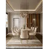 Designer Italian-Style Chair in Beige and Gold BUBBLE w jasnym wnętrzu, idealna do nowoczesnych aranżacji. Meble na zamówienie od Primavera Home.
