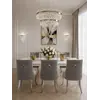 Piękne krzesło tapicerowane na wystawie w showroomie. Detal wykończenia od Primavera Home.
