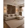 Kinkiet Kryształowy Złoty Podłużny Crystal eksponowany w showroomie, idealny do nowoczesnych wnętrz. Meble na zamówienie od Primavera Home.