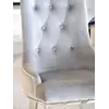Luksusowe krzesło glamour, pikowane z kołatką, do jadalni, na stalowych, prostych nogach, szare, srebrne MADAME widok ze skrzydła mebla. Aranżacja nowoczesnego wnętrza od Primavera Home.