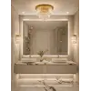 Plafon Kryształowy GLAMOUR Złoty Ø50cm w kontekście nowoczesnego wnętrza. Ekspozycja w salonie od Primavera Home.