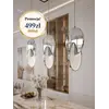 Zbliżenie na detale Żyrandola Planet Srebrny Glamour, podkreślające jego wykończenie. Ekspozycja w salonie od Primavera Home.