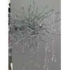 Kinkiet Srebrny Glamour Rain w aranżacji nowoczesnego salonu, dodający blasku i klasy.