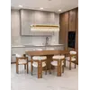Krzesło Designerskie Forest w całym zestawie mebli, wprowadzające harmonię do wnętrza. Ekspozycja w salonie od Primavera Home.