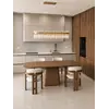 Krzesło Designerskie Forest uchwycone z tyłu, uwidaczniające jego elegancki kształt. Detal wykończenia od Primavera Home.