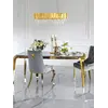 Designerski stół do jadalni, glamour, ze szklanym blatem, stalowy, złoty ELITE w luksusowej aranżacji wnętrza. Ekspozycja od Primavera Home.