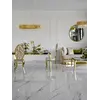 Designerski stół do jadalni, glamour, ze szklanym blatem, stalowy, złoty ELITE z widokiem na ogród. Meble na zamówienie od Primavera Home.