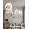 Ekspozycja żyrandola w showroomie, ukazująca jego elegancję i styl. Oferowane przez Primavera Home.
