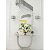 Widok 3D na konsolę w stylu nowoczesnym glamour z białym marmurowym blatem srebrna ART DECO, ukazujący jej nowoczesny charakter. Oświetlenie na zamówienie od Primavera Home.