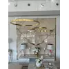 Zbliżenie na złoty kolor lampy glamour led okrągłej z połyskiem ring regulowana, nowoczesna, loft do salonu GALASSIA. Meble na zamówienie od Primavera Home.