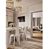 Zbliżenie na materiał obicia Hokera Glamour PALACE Beżowy Biały, prezentujący jego jakość. Ekspozycja w salonie od Primavera Home.