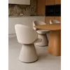 Nowoczesne Krzesło Obrotowe Dolce – Tapicerowane i Designerskie z perspektywy boku, prezentujące elegancki design. Meble na zamówienie od Primavera Home.