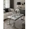 Stolik kawowy w stylu nowojorskim i glamour stal nierdzewna blat biały marmur OSKAR SILVER OUTLET 2 widoczny z boku. Meble na zamówienie od Primavera Home.