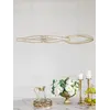 Zbliżenie na kryształowe detale żyrandola LILIBET L Złoty. Projekt inspirowany stylem glamour od Primavera Home.