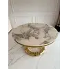 Perspektywa ukazująca Ekskluzywny Okrągły Stół Antonio 130 cm w przestrzeni jadalni od Primavera Home.