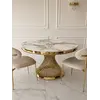 Widok z góry na Ekskluzywny Okrągły Stół Antonio 130 cm w minimalistycznym wnętrzu od Primavera Home.