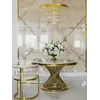 Elegancka kompozycja z Ekskluzywnym Okrągłym Stołem Antonio 130 cm w stylowej aranżacji od Primavera Home.