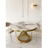 Stylowa aranżacja wykorzystująca Ekskluzywny Okrągły Stół Antonio 130 cm od Primavera Home.