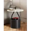 Stolik kawowy nowoczesny okrągły z ekosóry Tavolino z dodatkowymi elementami dekoracyjnymi. Aranżacja nowoczesnego wnętrza od Primavera Home.